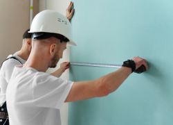 medium shot men working together 1